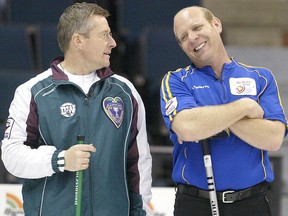 Alberta skip Kevin Martin, left, shares a moment with PEI skip Peter Gallant during a break in Brier play in 2008
