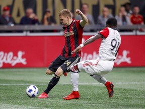 Atlanta United defender Julian Gressel (24) shoots in the first half of an MLS soccer game against the D.C. United on Sunday, March 12, 2018, in Atlanta.