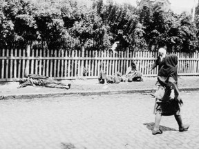 Starved peasants on a street in Kharkiv, 1933.