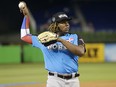 In this July 9, 2017, file photo, World Team designated hitter Vladimir Guerrero Jr., of the Toronto Blue Jays, warms up before the All-Star Futures game, in Miami. (AP Photo/Lynne Sladky, File)