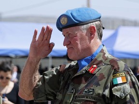 Head of Mission and Force Commander of the United Nations Interim Force in Lebanon (UNIFIL), Maj. Gen. Michael Beary of Ireland, reviews an honor guard of United Nations peacekeepers, on his arrival at their headquarters, during a ceremony to mark the 40th anniversary of UNIFIL's peacekeeping presence in southern Lebanon, in the coastal town of Naqoura, Lebanon, Monday, March 19, 2018.