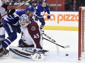 Toronto Maple Leafs centre Auston Matthews scores against Colorado Avalanche goaltender Jonathan Bernier during second period of an NHL game on Jan. 22, 2018. The goal was called back because of goaltender interference.
