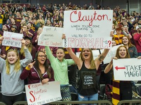 Fans cheer as the Loyola basketball team enters the Gentile Arena, Sunday, March 25, 2018 in Chicago.