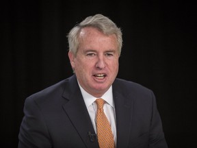 FILE - In this Jan. 17, 2018 file photo, Illinois Democratic gubernatorial candidate Chris Kennedy participates in a forum with the Chicago Sun-Times Editorial Board in Chicago.