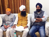 Canadian MPs Kevin Lamoureux (orange hat) and Randeep Sarai (white) with former Punjabi politician Bikram Majithia.