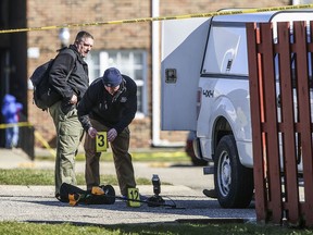 Police investigate the scene of a shooting, Friday, March 2, 2018 in Lebanon, Ind, Jacob Pickett, a central Indiana sheriff's deputy who was shot in the head while chasing three suspects won't survive and was on life support for donation of his organs, authorities said Friday.