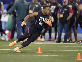 Arizona State running back Demario Richard runs a drill at the NFL football scouting combine in Indianapolis, Friday, March 2, 2018.