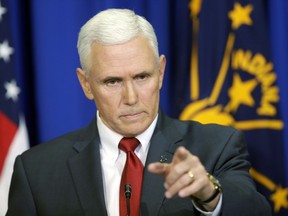 FILE - In this March 31, 2015, file photo, Indiana Gov. Mike Pence takes a question during a news conference discussing the state's new religious-freedom law in Indianapolis. Then-Indiana Gov. Mike Pence faced a firestorm of criticism three years ago after signing a "religious freedom" law critics decried as anti-gay.