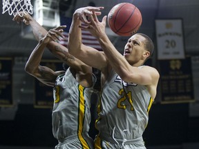 FILE - In this Dec. 21, 2017, file photo, Southeastern Louisiana University's James Currington, left, and Jordan Capps (21) fight for a loose ball during an NCAA college basketball game against Notre Dame in South Bend, Ind. The sight of Southeastern Louisiana starter James Currington recuperating from a bullet wound suffered in a shootout near student housing has provided the Lions with a new perspective on their program's best basketball season in more than a decade. Regardless of how the Southland Conference's top seed fares this postseason, the Lions can be grateful no one was killed when some of their players wound up in the midst of another episode of gun violence on a school campus a few weeks ago.
