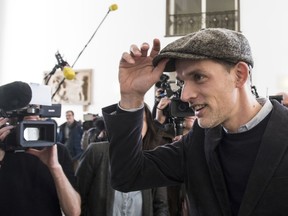 Former Dortmund coach and eye witness Thomas Tuchel arrives at the trial against Sergej W., no family name given due to German privacy laws, who is charged with detonating three bombs targeting the Borussia Dortmund soccer team bus last April, at the German state court in Dortmund, Germany, Monday March 19, 2018.the trial