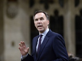 Minister of Finance Bill Morneau rises during Question Period in the House of Commons on Parliament Hill in Ottawa on Thursday, March 1, 2018.