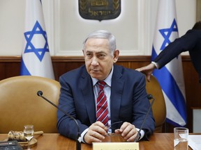 Israeli Prime Minister Benjamin Netanyahu chairs the weekly cabinet meeting at his office in Jerusalem, March 25, 2018.