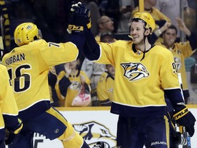 P.K. Subban and Predators teammate Ryan Johansen celebrate after beating the Winnipeg Jets 3-1 on Tuesday night in Nashville, Tenn.