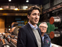 Prime Minister Justin Trudeau with Public Safety Minister Ralph Goodale in Regina on Wednesday. Trudeau said he spoke with Prime Minister Theresa May to offer Canada's support.