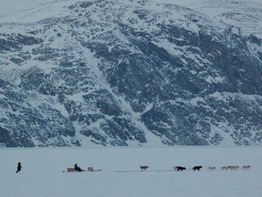 A dog team crosses Wakeham Bay near Kangiqsujuaq, Nunavik