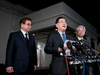 South Korean national security director Chung Eui-yong, centre, speaks to reporters at the White House on Thursday, as intelligence chief Suh Hoon, left and Cho Yoon-je, the South Korea ambassador to U.S., listen.