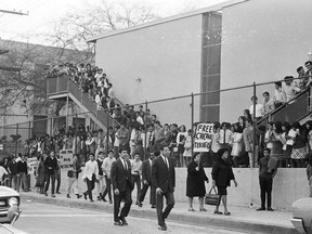 This March 1968 photo provided by the UCLA Chicano Studies Research Center shows protesters during the Theodore Roosevelt High School walkout. Participants of a 1968 Los Angeles high school walkout over dropout rates, paddle beatings for speaking Spanish and other issues say they are hearing echoes of those protests in the voices of outraged students at Marjory Stoneman Douglas High School in Parkland, Florida, where 17 people died in a mass shooting. Theodore Roosevelt was one of the several high schools joining the protest.