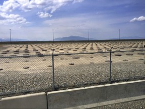 FILE - In this May 11, 2015, file photo, nuclear waste is stored in underground containers at the Idaho National Laboratory near Idaho Falls, Idaho. U.S. officials are considering extending the use of the eastern Idaho nuclear waste treatment facility beyond its scheduled closure this year so it can repackage radioactive waste brought in from other states before it's sent to a permanent disposal site in New Mexico.