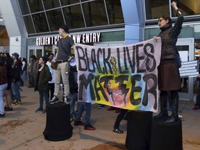 Black Lives Matter and other demonstrators protesting this week's fatal shooting of an unarmed black man gather outside Golden 1 Center before the scheduled tipoff of an NBA basketball game between the Atlanta Hawks and the Sacramento Kings in Sacramento, Calif., Thursday, March 22, 2018. Hundreds of people rallied for Stephon Clark, a 22-year-old who was shot Sunday in his grandparents' backyard. Police say they feared he had a handgun when they confronted him after reports that he had been breaking windows, but he only had a cellphone.