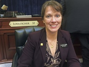 In this Thursday, March 1, 2018 photo, Idaho Republican state Rep. Priscilla Giddings sits at the Capitol in Boise. The Idaho lawmaker urges her constituents to send in submissions for her "fake news awards" during the legislative session. Officials at all levels of government are now using the term "fake news" as a weapon against unflattering stories and information that can tarnish their images. Experts on the press and democracy say the cries of "fake news" could do long-term damage by sowing confusion and contempt for journalists, and by undermining the media's role as a watchdog on government and politicians.