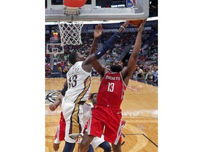 New Orleans Pelicans forward Cheick Diallo (13) blocks a shot by Houston Rockets guard James Harden during the second half of an NBA basketball game in New Orleans, Saturday, March 17, 2018. The Rockets won 107-101.