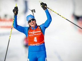 Susan Dunklee from USA crosses the finish line in third place at the IBU Biathlon World Cup Women 10 km Pursuit Competition in Holmenkollen, Oslo, Sunday March 18. 2018.