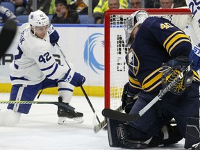 Toronto Maple Leafs forward Tyler Bozak puts the puck past Sabres netminder Robin Lehner during the second period of their game Thursday night in Buffalo, N.Y.