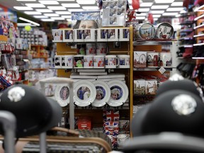 Souvenir items are displayed for sale ahead of the upcoming royal wedding of Britain's Prince Harry and Meghan Markle, at a shop in London, Wednesday, March 28, 2018. The wedding takes place on Saturday May 19 in Windsor Castle, England.