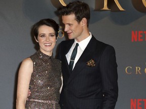 FILE - In this Tuesday, Nov. 21, 2017 file photo, actors Claire Foy, left, and Matt Smith pose for photographers on arrival at the premiere of the series 'The Crown, Season 2' in central London. Producers of the Netflix drama "The Crown" apologized Tuesday to actors Claire Foy and Matt Smith over the revelation that Foy was paid less than her male co-star.