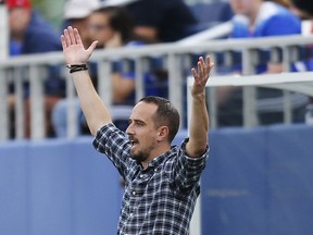 FILE - In this Wednesday, March 9, 2016 file photo, England women's team soccer coach Mark Sampson reacts during a game against France in the SheBelieves Cup, in Boca Raton, Fla. USA.  on Friday March 23, 2018, UEFA banned Sampson for three games, for intimidating a female referee liaison officer with "insulting, aggressive and insistent actions," including profane abuse, at the 2017 European Championship.