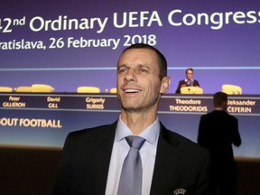 FILE - A Monday, Feb. 26, 2018 file photo of UEFA President Aleksander Ceferin before a press conference after the 42nd ordinary UEFA congress in Bratislava, Slovakia. UEFA said Friday March 16, 2018 that Ceferin earns a pre-tax salary of 1.56 million Swiss francs ($1.64 million). The disclosure Friday fulfills UEFA's 2016 promise to publish what it pays top officials.