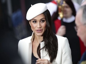 Britain's Prince Harry's fiancee Meghan Markle leaves the Commonwealth Service at Westminster Abbey, London Monday March 12, 2018.