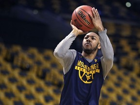 West Virginia's Jevon Carter shoots during practice at the NCAA men's college basketball tournament in Boston, Thursday, March 22, 2018. West Virginia faces Villanova in a regional semifinal on Friday.