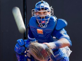 Toronto Blue Jays Russell Martin catches in the bullpen at spring training in Dunedin, Fla., on Feb. 20.