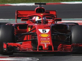 Ferrari driver Sebastian Vettel of Germany steers his car during a Formula One pre-season testing session in Montmelo, outside Barcelona, Spain, Wednesday, March 7, 2018.