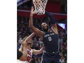 Detroit Pistons center Andre Drummond (0) is fouled by Chicago Bulls center Robin Lopez (42) during the first half of an NBA basketball game, Friday, March 9, 2018, in Detroit.