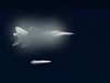 A Russian MiG-31 fighter jet launches the new Kinzhal hypersonic missile during a test in southern Russia.