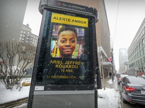 Electronic billboard on Mountain St in Montreal displays amber alert for missing ten year old Ariel Jeffrey Kouakou Tuesday March 13, 2018.