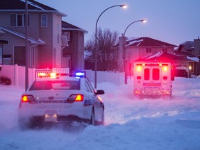 An emergency medical vehicle takes a turn from Ball Road onto Laurier Crescent after attending an incident on the 2000 block of Dunnison Crescent.