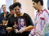 Delores Daniels holds a photo of her murdered daughter Serena McKay prior to a press conference calling for a re-organization of the National Inquiry into Missing and Murdered Indigenous Women and Girls, in Winnipeg, July 12, 2017.