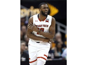 Texas Tech's Brandone Francis celebrates after sinking a shot during the first half of the team's NCAA college basketball game against West Virginia in the Big 12 men's tournament Friday, March 9, 2018, in Kansas City, Mo.