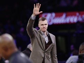 New York Knicks' Kristaps Porzingis (6) waves to fans before an NBA basketball game against the Dallas Mavericks Tuesday, March 13, 2018, in New York.