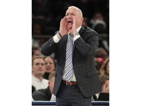 Penn State coach Pat Chambers shouts to players during the first half of an NCAA college basketball game against Mississippi State in the semifinals of the NIT, Tuesday, March 27, 2018, in New York.