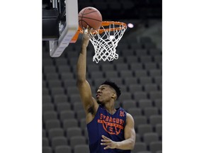 Syracuse's Tyus Battle (25) shoots during practice at the NCAA men's college basketball tournament, in Omaha, Neb., Thursday, March 22, 2018. Syracuse faces Duke in a regional semifinal on Friday.