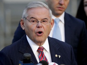 FILE – In this Nov. 16, 2017, file photo, U.S. Sen. Bob Menendez speaks to reporters after U.S. District Judge William H. Walls declared a mistrial in Menendez' federal corruption trial, during a news conference outside the Martin Luther King Jr. Federal Building and U.S. Courthouse in Newark, N.J. Menendez announced plans Tuesday, March 27, 2018, to kick off his re-election bid for a third term, two months after federal prosecutors dropped corruption charges against the New Jersey Democrat. Top Democrats including fellow U.S. Sen. Cory Booker and New Jersey Gov. Phil Murphy are set to join Menendez during Wednesday, March 28, 2018, events in his hometown of Union City, N.J., where he was once mayor, and in southern New Jersey.