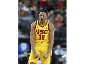 Southern California's Elijah Stewart reacts after a score during the first half of the team's NCAA college basketball game against Oregon in the semifinals of the Pac-12 men's tournament Friday, March 9, 2018, in Las Vegas.