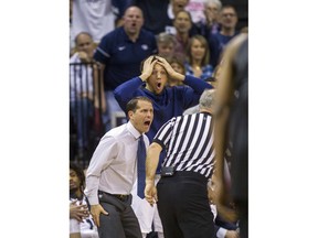Nevada head coach Eric Musselman is furious by a referee's foul call versus San Diego State during the first period of an NCAA college basketball semifinals game in the Mountain West Conference tournament Friday, March 9, 2018, in Las Vegas.