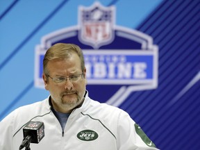 FILE - In this Feb. 28, 2018, file photo, New York Jets general manager Mike Maccagnan speaks during a press conference at the NFL football scouting combine in Indianapolis. The Jets have acquired the No. 3 overall pick in the NFL draft from the Indianapolis Colts on Saturday, March 17, 2018,, moving up three spots in a sign that they intend to get one of the top quarterbacks available. The Jets are sending the Colts their first-rounder, No. 6 overall ,along with two second-rounders this year and a second-rounder next year to complete the massive deal.