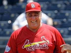 FILE - In this May 22, 2010, file photo, former St. Louis Cardinals baseball player Jack Clark smiles during a softball game against former Kansas City Royals players, in Kansas City, Mo. Jack Clark, who hit 340 home runs over an 18-year major league career, has filed for bankruptcy protection. Clark and his wife, Angela, filed a voluntary petition March 6 in U.S. Bankruptcy Court in St. Louis. Clark's attorney, Al Watkins, said Friday, March 23, 2018, they owe more than $550,000 and have a combined annual income of about $120,000.