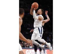 FILE - In this March 8, 2018, file photo, Villanova guard Jalen Brunson (1) goes up for a shot during the first half of an NCAA college basketball quarterfinal game in the Big East conference tournament, in New York. Brunson is a member of the Associated Press NCAA college basketball All-America first team, announced Tuesday, March 27, 2018.